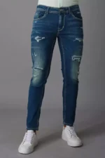 ROOKIES  MEDIUM BLUE JEANS 5 POCKET LOW-RISE ANKLE LENGTH JEANS (SPRINGSTEEN FIT) TORN JEANS